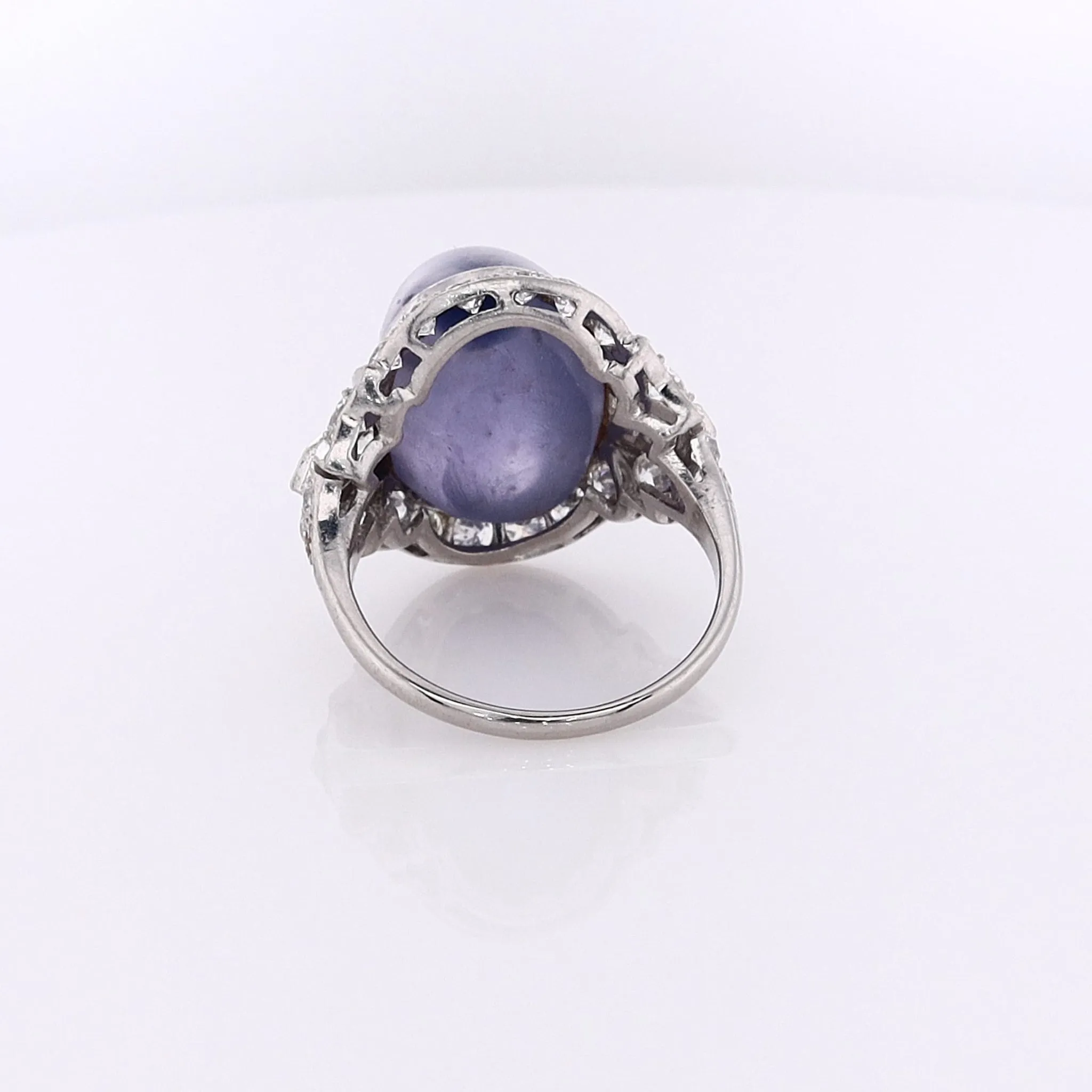 Estate Platinum Star Sapphire and Diamond Halo Ring