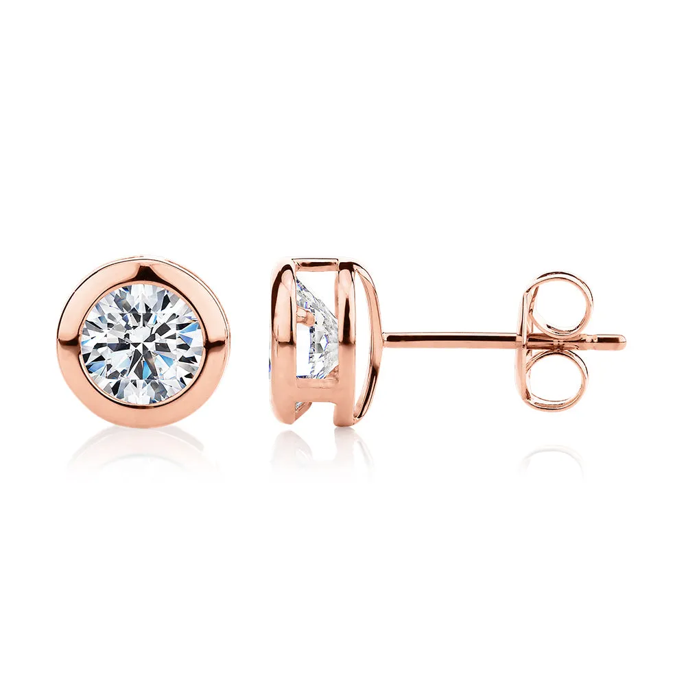 Round Brilliant stud earrings with 2 carats* of diamond simulants in 10 carat rose gold